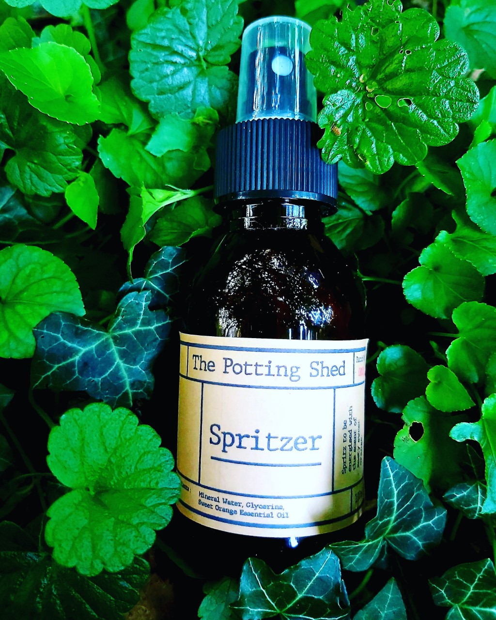 Orange essential oil spritzer bottle.